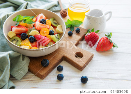 Healthy fresh fruit salad in a bowl 92405698
