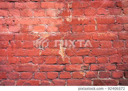 Empty brick red wall. background of a old brick house. 92406872