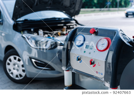 Car conditioning air ac repair service. Check automotive vehicle conditioning system and refill automobile ac compressor. Diagnostic auto car conditioner service. 92407663