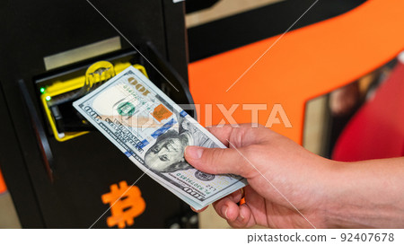 Atm bitcoin cryptocurrency machine. Woman withdraw american dollar bill cash. Usd hundred money payment on virtual crypto currency btc wallet. Bitcoin BTC ATM Cash Machine. Atm bitcoin cryptocurrency machine. Woman withdraw american dollar bill cash. Usd hundred money payment on virtual crypto currency btc wallet. Bitcoin BTC ATM Cash Machine. 92407678