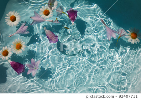 Top view of bath filled with flowers spa or selfcare concept 92407711