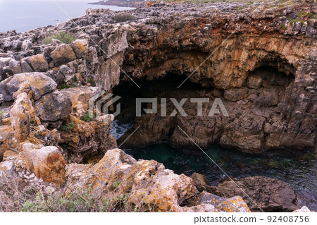 Gorge in the rocks above the ocean 92408756