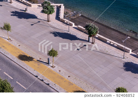 Embankment and the beach of the Portuguese city of Sines 92408852