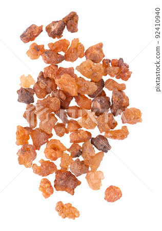Myrrh resin isolated on white background. Pile of natural Commiphora myrrha. Sweet Myrrh Opoponax. Incense. Top view. 92410940