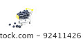 small shopping cart full of fresh blueberry isolated. selective focus 92411426