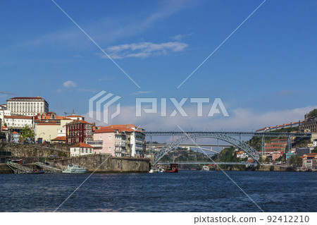 City view from the river Douro. Porto, Portugal. Dom Lu s I Bridge. 92412210