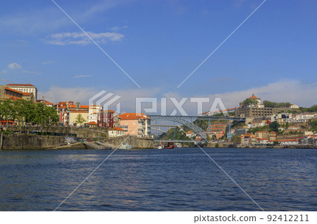 City view from the river Douro. Porto, Portugal. Dom Lu s I Bridge. 92412211