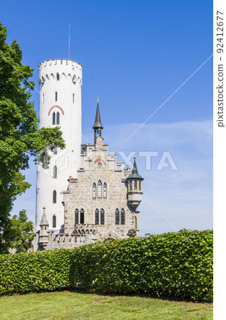 Lichtenstein castle on forested rock cliff in Swabian Alps in summer Lichtenstein castle on forested rock cliff in Swabian Alps in summer 92412677