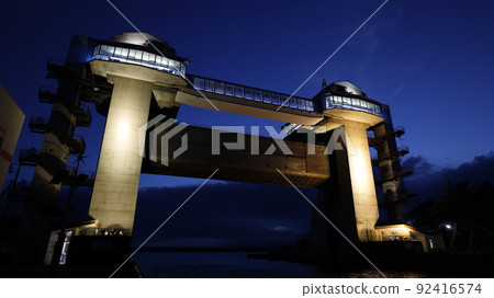 Large observatory sluice gate "Byuo" lit up in the color of the Ukrainian flag in protest of Russia's military invasion of Ukraine 92416574