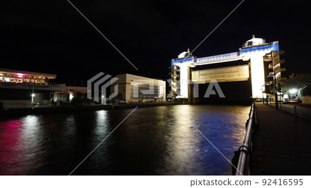 Large observatory sluice gate "Byuo" lit up in the color of the Ukrainian flag in protest of Russia's military invasion of Ukraine 92416595