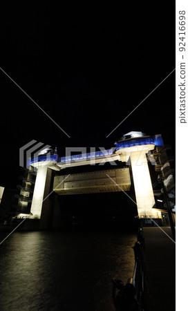 Large observatory sluice gate "Byuo" lit up in the color of the Ukrainian flag in protest of Russia's military invasion of Ukraine 92416698