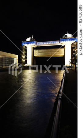 Large observatory sluice gate "Byuo" lit up in the color of the Ukrainian flag in protest of Russia's military invasion of Ukraine 92416699