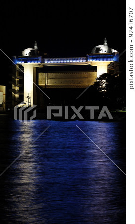Large observatory sluice gate "Byuo" lit up in the color of the Ukrainian flag in protest of Russia's military invasion of Ukraine 92416707