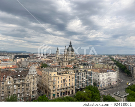 St. Stephen Basilica among ancient buildings in the city center. Budapest, Hungary St. Stephen Basilica among ancient buildings in the city center. Budapest, Hungary 92418061