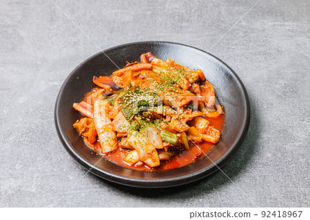Spicy Seafood Squid Stir-fry Korean Cuisine Food on Black Plate 92418967
