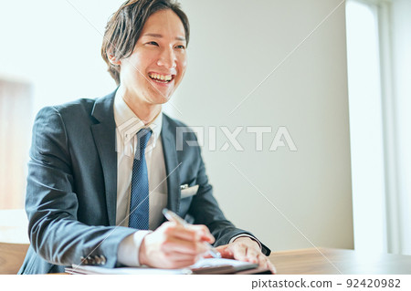 Young man doing visiting business 92420982