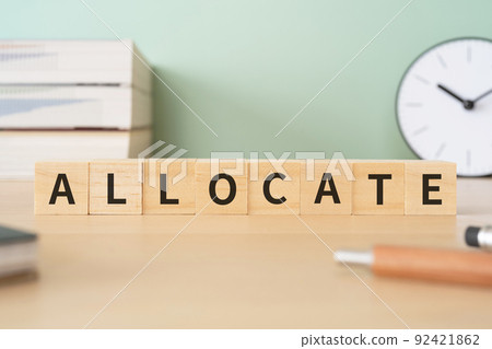 Image of distribution | Desk with a block labeled "ALL OCATE" Image of distribution | Desk with a block labeled "ALL OCATE" 92421862