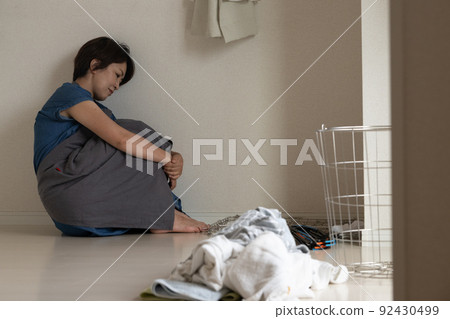 Female housewife feeling tired, tired image of menopause Female housewife feeling tired, tired image of menopause 92430499