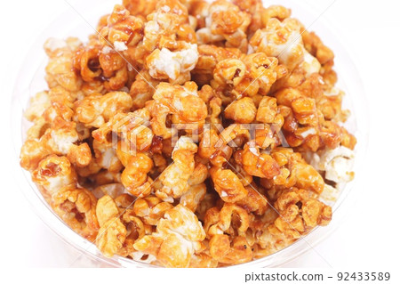 Popcorn caramel flavor sweet snack bright background 92433589