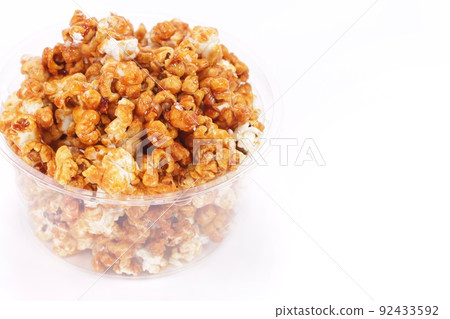 Popcorn caramel flavor sweet snack bright background 92433592
