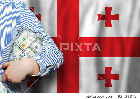 Banking, business and currency exchange in Georgia. US dollars cash money in glass jar 92433872