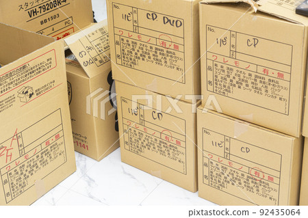 Unopened luggage after moving 92435064