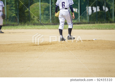 A youth baseball pitcher 92435310