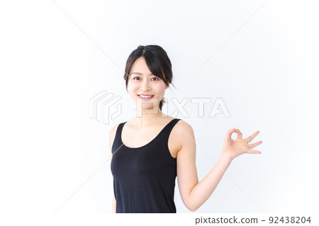 給一個好標誌的一個興高采烈的少婦 給一個好標誌的一個興高采烈的少婦 92438204