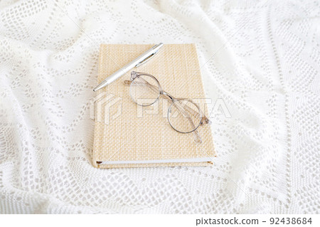 Notebook and glasses Natural image 92438684