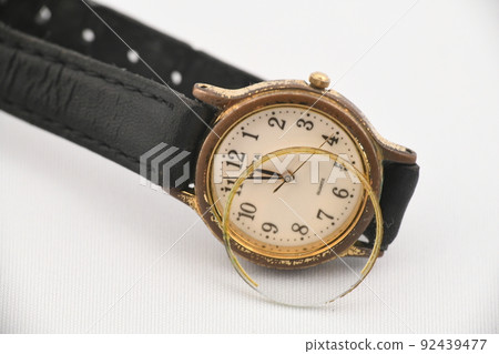 Old women's wristwatch with broken glass Old women's wristwatch with broken glass 92439477