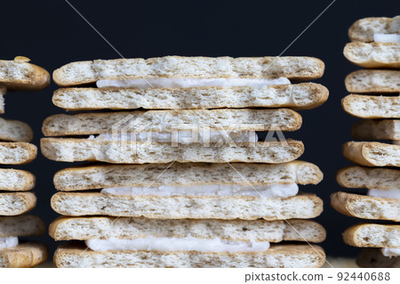 puff pastry sandwiches with cream filling 92440688