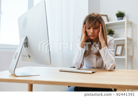 Shocked adorable blonde businesswoman made big mistake in report look aside touch cheeks sitting at workplace in modern office. Unhappy employee work on computer online in support service. Copy space Shocked adorable blonde businesswoman made big mistake in report look aside touch cheeks sitting at workplace in modern office. Unhappy employee work on computer online in support service. Copy space 92441391