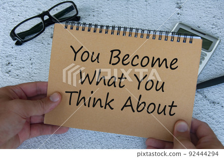You become what you think about text written on brown notepad. Motivational concept. You become what you think about text written on brown notepad. Motivational concept. 92444294