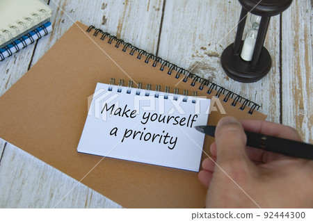 Life inspirational quote text on notepad - Make yourself a priority. Life Inspirational concept Life inspirational quote text on notepad - Make yourself a priority. Life Inspirational concept 92444300