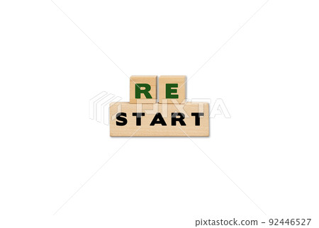 Restart symbol on wooden cubes. Business restart with copy space. 92446527