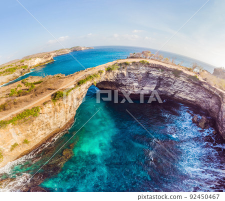 Landscape over Broken Beach in Nusa Penida, Indonesia Angel's BillaBong Beach. Popular tourist destination Bali Landscape over Broken Beach in Nusa Penida, Indonesia Angel's BillaBong Beach. Popular tourist destination Bali 92450467