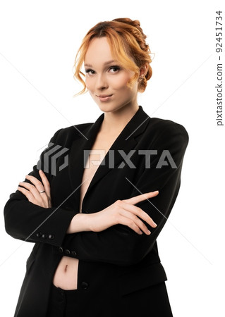 portrait of a sexy redhead businesswoman isolated on white portrait of a sexy redhead businesswoman isolated on white 92451734