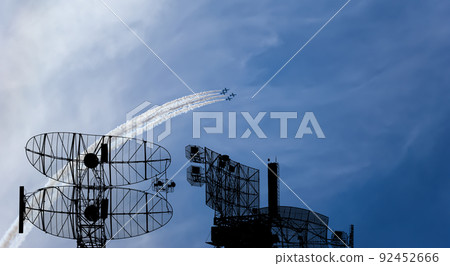 Air defense raiders of military mobile anti-aircraft complexes (radar is designed and automatic tracking of targets and missiles) against the background of the flight of modern combat fighters,Russia Air defense raiders of military mobile anti-aircraft complexes (radar is designed and automatic tracking of targets and missiles) against the background of the flight of modern combat fighters,Russia 92452666