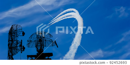 Air defense raiders of military mobile anti-aircraft complexes (radar is designed and automatic tracking of targets and missiles) against the background of the flight of modern combat fighters,Russia Air defense raiders of military mobile anti-aircraft complexes (radar is designed and automatic tracking of targets and missiles) against the background of the flight of modern combat fighters,Russia 92452693