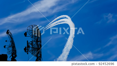 Air defense raiders of military mobile anti-aircraft complexes (radar is designed and automatic tracking of targets and missiles) against the background of the flight of modern combat fighters,Russia Air defense raiders of military mobile anti-aircraft complexes (radar is designed and automatic tracking of targets and missiles) against the background of the flight of modern combat fighters,Russia 92452696