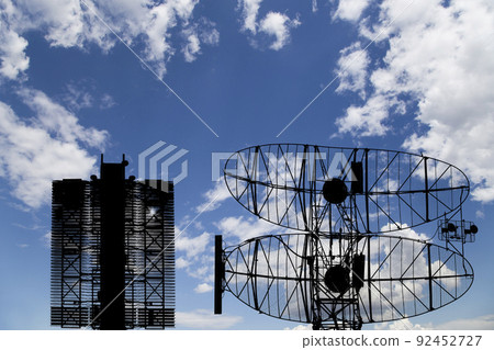 Air defense radars of military mobile anti aircraft systems (radar is designed and automatic tracking of targets and missiles) , modern army industry on background clouds and sky,Russia Air defense radars of military mobile anti aircraft systems (radar is designed and automatic tracking of targets and missiles) , modern army industry on background clouds and sky,Russia 92452727