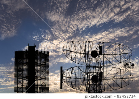 Air defense radars of military mobile anti aircraft systems (radar is designed and automatic tracking of targets and missiles) , modern army industry on background clouds and sky,Russia Air defense radars of military mobile anti aircraft systems (radar is designed and automatic tracking of targets and missiles) , modern army industry on background clouds and sky,Russia 92452734