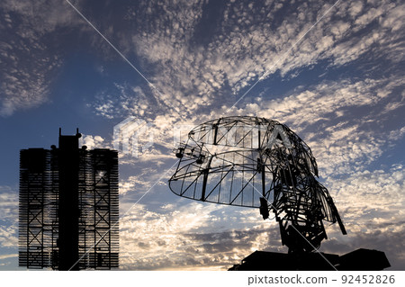 Air defense radars of military mobile anti aircraft systems (radar is designed  and automatic tracking of targets and missiles) , modern army industry on background clouds and sky,Russia 92452826