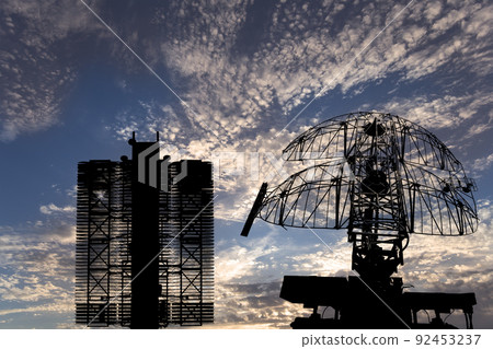 Air defense radars of military mobile anti aircraft systems (radar is designed and automatic tracking of targets and missiles) , modern army industry on background clouds and sky,Russia Air defense radars of military mobile anti aircraft systems (radar is designed and automatic tracking of targets and missiles) , modern army industry on background clouds and sky,Russia 92453237