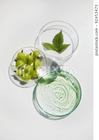 Abstract cosmetic laboratory. Organic cosmetics with gooseberry's Abstract cosmetic laboratory. Organic cosmetics with gooseberry's 92453473