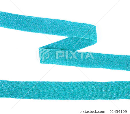 knit stripes elastic ribbon band, webbing, herringbone tapes, lustrous yarn for clothes, trousers, jackets. Stripe and zigzag. elastic sewing material on a white background 92454109