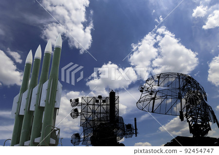 Air defense radars of military mobile anti aircraft systems and modern Russian anti aircraft missiles OSA-AKM on background clouds and sky,Russia 92454747