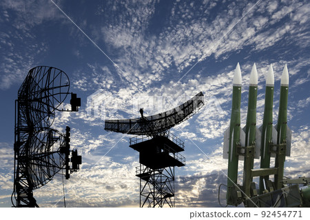 Air defense radars of military mobile anti aircraft systems and modern Russian anti aircraft missiles OSA-AKM on background clouds and sky,Russia 92454771