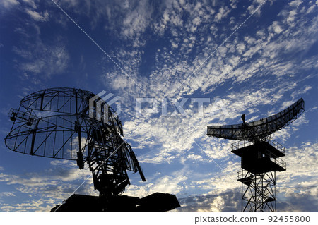 Air defense radars of military mobile anti aircraft systems, modern army industry on background beautiful clouds and sky, Russia 92455800