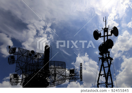 Air defense radars of military mobile anti aircraft systems, modern army industry on background beautiful clouds and sky, Russia 92455845